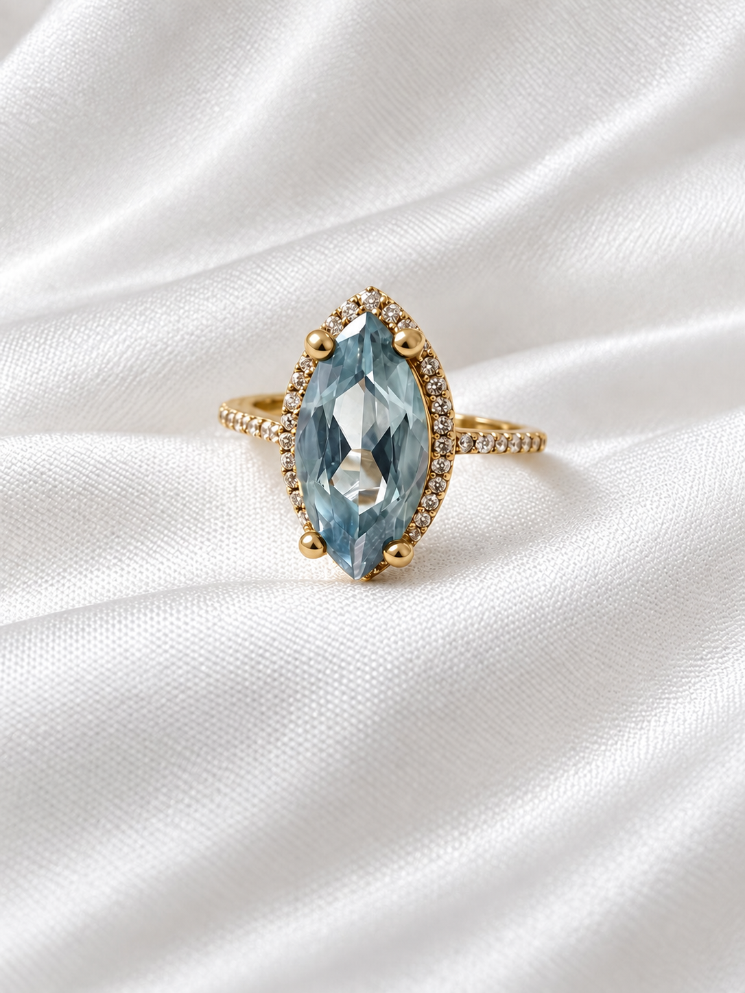10K Yellow Gold Light Blue Marquise Halo Ring